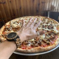 Huge pizzas! at 3 Brothers Vegan Cafe in Copiague
