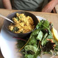 Broccoli mac n cheese so good came with a nice mixed green salad  at Cadence in Guelph