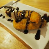 vegan banana fritters with ice cream at Mai Kitchen in Ferryden Park