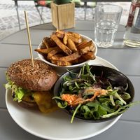 Trefoil burger with homemade cheddar, onions, lettuce, and the best chips I have ever had!!   at Beet in Luxembourg City