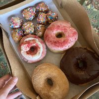 Glazed & sprinkled donut holes (my fav!), strawberry, strawberry cheesecake, chocolate, and cinnamon sugar 😋 got these for non-vegan family in town and they loved them!    at The Big O Doughnuts in Salt Lake City