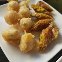 vegan sai ou (Chiang Mai sausages) and fried fishballs at Guan Yim in Lampang
