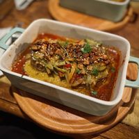 Oven-baked homemade seitan with Thai vegetables and topped with tofu cheese  at Karuzo in Sarajevo