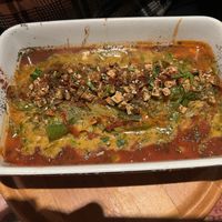 Homemade seitan in vegetable gravy topped with roasted tofu chunks  at Karuzo in Sarajevo