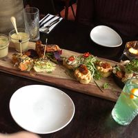 Proeverij van heerlijke voorgerechten. Mosterdsoep, juicy corn ribs, no-salm tompouce, bruschetta mix, caesar salad. at Eetcafe Spinoza in Leeuwarden