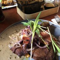 Vegan schnitzel (breaded eggplant)  at Eetcafe Spinoza in Leeuwarden