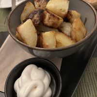 Rosemary & garlic potatoes with mayo  at NovaPizza Vegan Kitchen in Edinburgh