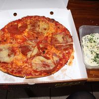 Pepperoni pizza and four-cheese bruschetta (vegan)  at NovaPizza Vegan Kitchen in Edinburgh
