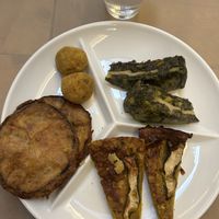 Arancini, sfrittata, fried eggplant, spinach cake  at Flora in Verona