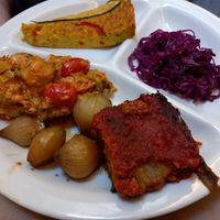 Aubergine "parmiagani ", fritatta,  sprout dish, onions and red cabbage at Flora in Verona