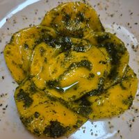 Ravioli con pesto di rucola at Flora in Verona