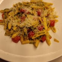 Pasta with vegan cheese and veggies. at Flora in Verona