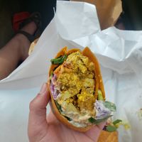the hayao miyazaki: curried tofu, spinach, carrot, red cabbage, vegan mayo in a sundried tom wrap at Two Beards Deli in Grand Rapids
