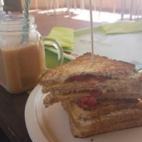 tomato vegan cheese toast at Feliz Cafe in Peschiera Del Garda