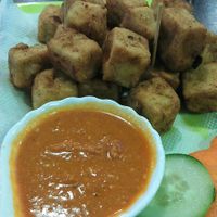 Tofu pakoda - fried tofu with corn flour and sesame seeds at Loving Heart in Kathmandu