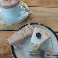 Hot chocolate and lemon cake at Oats Healthy Living Store in Brixham