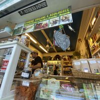 Store front from outside & dessert window at Vegan Store Stall 83 in Rome