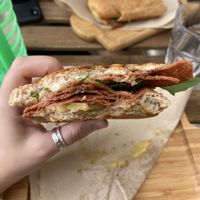 Panini with vegan salami, & vegan emmental & Parmesan with rocket & mustard. Spectacular! at Vegan Store Stall 83 in Rome