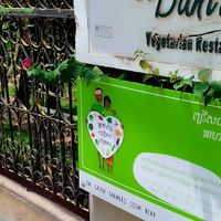 Look for the sign on the sidewalk and hidden entrance at Banlle in Siem Reap