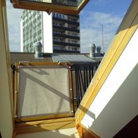 window which turns into a balcony at Hotel Sandwirth in Klagenfurt