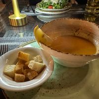Vegan lentil soup with a vegetable stock, croutons made with out butter. at Platan in Samarkand