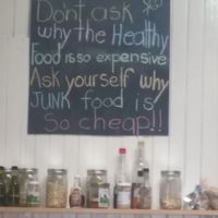 One of the great little signs in the café  at Organico Fortuna in La Fortuna