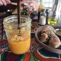 Smoothie, side of bread, and green volcano sandwich  at Organico Fortuna in La Fortuna