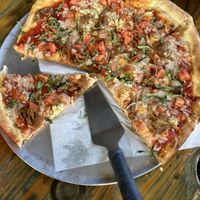 Venetian pizza minus diary and meat items and with vegan cheese instead - yummy!   at Red Tractor Pizza in Bozeman