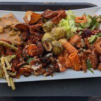 Large plate with a huge variety of foods at Sattgrün in Essen