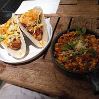 Mock fish tacos with hearts of palm and Mexican street corn on the side. at Bar Bombon in Philadelphia