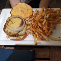 Chorizo burger with a side of cheese fries. at Bar Bombon in Philadelphia
