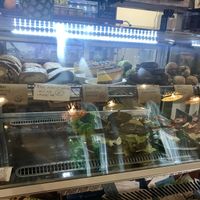 Daily cake and sandwich selection at bistRAW & Tea in Prague