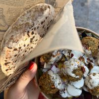 Falafel bowl and bread. at Falafel Vegano - Food Stall in Barcelona