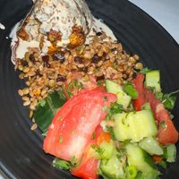 Cauliflower with a tahini sauce, yummy grains and a Mediterranean salad  at Full Bloom in Miami Beach