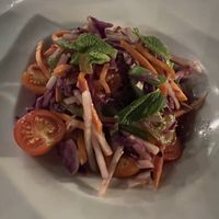 Raw salad with carrot, green papaya ...  at Full Bloom in Miami Beach