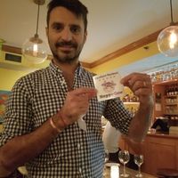 Giving a window sticker for their great reviews! at Full Bloom in Miami Beach