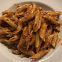 Penne pasta with sun dried tomato pesto at Pasta and Social in Rome