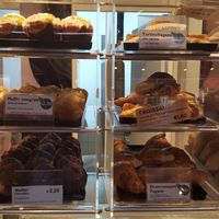 vegan carrot cake at the top, vegan apricot croissant at the bottom at Moka Bar and Snack in Rome