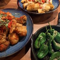 Cauliflower wings, Cajun chips and padron peppers    at 2 Taps Winebar in Belfast