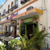 Entrance with outdoor seating at Hare Krishna Buffete in Monterrey