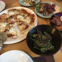 pizza and chicken not vegan- padron peppers, hispi cabbage, sweet potato fritters, patatas bravas  at Under the Stars  in Bristol