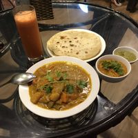 Végétales dhal + 3 rôtis and a healthy ginger carrot apple juice.  at Karma Waters in Hoi An