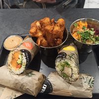 Double up on the sushi rolls, added cauliflower popcorn, plus rainbow salad at Happy Maki in Brighton