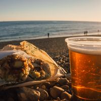 Get a roll, grab a beer and sit on the beach whilst watching the sunset. at Happy Maki in Brighton