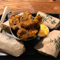 Popcorn cauliflower with spiced coconut sauce  at Happy Maki in Brighton