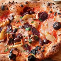 Artichokes, beetroots carpaccio, mozzarella, kalamata olived at Purezza in Brighton