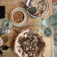 Garlic bread, macaroni cheese & mushroom & truffle pizza  at Purezza in Brighton