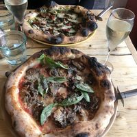 Back: the one with pesto / Front: the one with all the seasons (not sure?)  at Purezza in Brighton