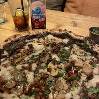 Black truffle pizza, pesto dip, karma cola   at Purezza in Brighton