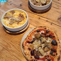 The set menu of a mini pizza and a small plate (+drink) + another small plate. The mac&cheese is amazing. at Purezza in Brighton